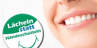 laecheln statt Händeschütteln